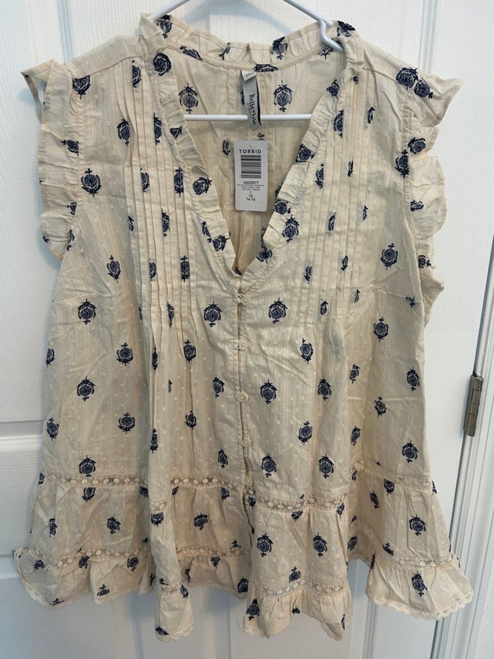 torrid Cream Blouse with Navy Floral Print and Ruffle Hem